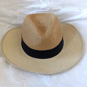 Straw hat with blue ribbon